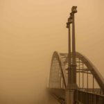 Concurso de fotografía Sony World Photography Award 2021 | a city under dust clouds