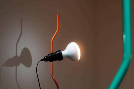 Parentesi 50th Aniversary. Achille Castiglioni y Pio Manzù. Flos. Nuevas lámparas de diseño | parentesi 50_turquoise and orange signal finish_achille castiglioni pio manzu 2