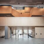 Tingbjerg Library and Culture House. COBE Architects. Biblioteca contemporánea | tingbjerg library and culture house_07_credit rasmus hjortshoj coast