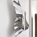 Reflecteur wall sculpture. Xavier Lust. Collectible Design Fair. Art design | xavier lust_reflecteur wall sculpture_mirror polished stainless steel_h 97 x 119 x 29 cm_copyright photo nicolas schimp 3