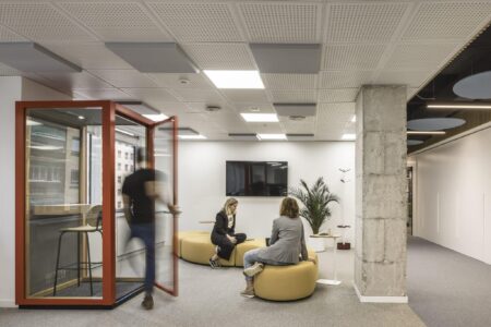 Destudio-spin-master-offices-06-phone-booth-and-sofa-with-people-d23378a3-3