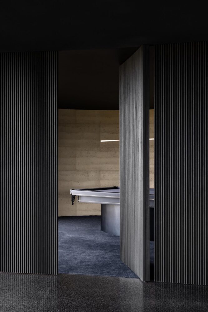 arquitectura orgánica, madera carbonizada, costa australiana
