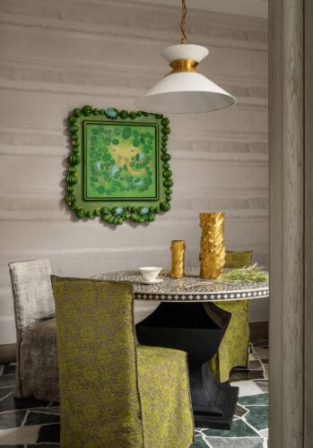 Moving beyond the round table, the space transitions into a fireside conversation setting. Here, the gaze is drawn to Chen Li's painting In My Eyes, Manman, where the artist's personal language is subtly embedded into thematic corners, entering into dialogue with color, light, and function.