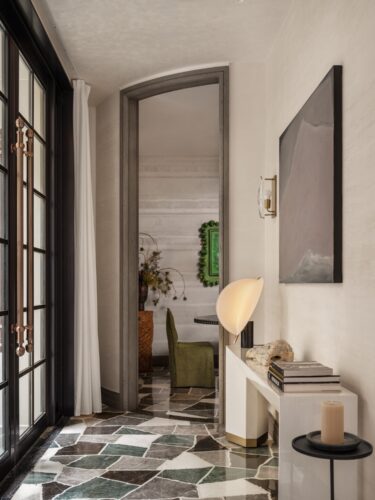 Wang Yizhou's Mountain (2025), rendered in restrained lines and tones, introduces the contemplative spirit of Eastern landscape painting, adding a layer of cultural stillness to the room.